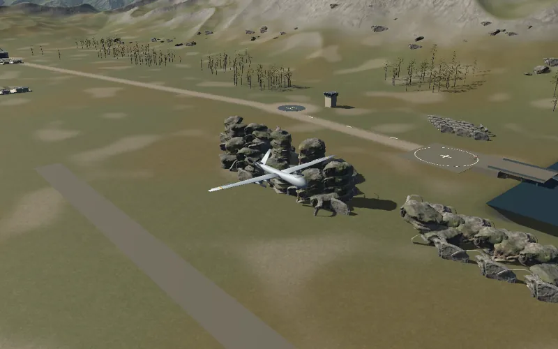 An enemy drone flying low over a green mountain valley